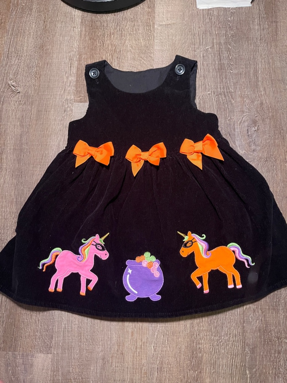 Black corduroy girls embroidered Unicorn Jumper Dress with Orange Bows 24 months